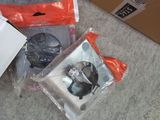 a box with some items on the floor next to it