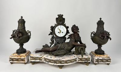 a statue of a woman sitting on a bench next to three vases and a clock