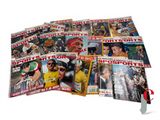 a lot of sports magazines on a white surface