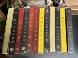 a lot of books that are sitting on a table