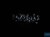 a close up of a bunch of diamonds on a black surface