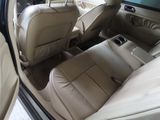 a view of the back seats of a car from the driver ' s seat