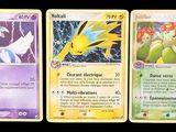 three pokemon cards are shown in a row on a black background