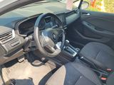 the interior of a car with a steering wheel and a dash board