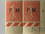 two stamps with a picture of a woman and a man on them