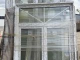 a large window that is sitting on the back of a truck