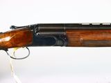a close up of a rifle on a white background with a tag