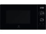 the black microwave oven has a digital clock on the front of it