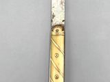 a knife that is sitting on a table