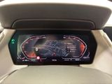 the dashboard of a car with a digital display in the center