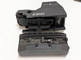 two batteries in the back of a camera