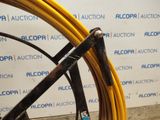 a close up of a bike with a yellow hose