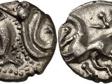 une pièce de monnaie en argent portant l'image d'un homme et d'une femme