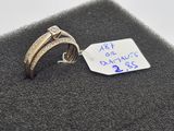 an image of a couple of rings sitting on top of a piece of cloth