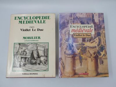 two books are sitting on a table next to each other