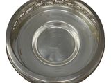 a silver plate on a white background with a white background