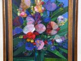 a painting of flowers in a vase on the wall