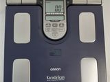 an image of a bathroom scale with a digital display on it