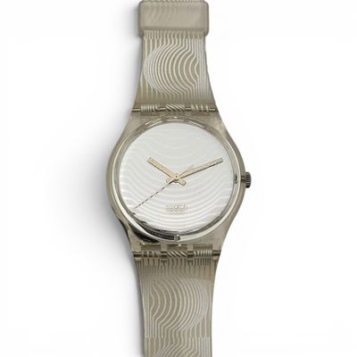 an image of a close up of a wrist watch on a white surface