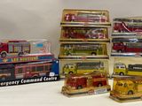 many different types of toy buses in the display case