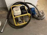 a machine that is sitting on the ground next to a wall