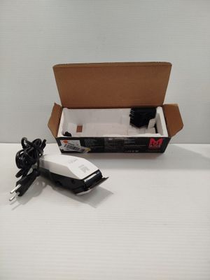 a box with a remote control and a charger in it