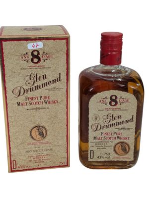 an image of a bottle of whisky next to a box