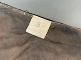 a close up of a piece of fabric with a tag on it
