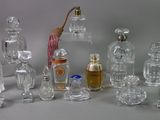 a lot of glass bottles that are sitting on a table