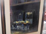 une photo d'un tableau représentant un restaurant avec des parasols jaunes