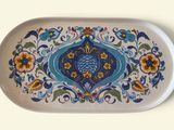 a white tray with a blue and yellow design on it