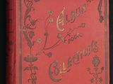 un vieux livre rouge avec des lettres dorées sur fond noir
