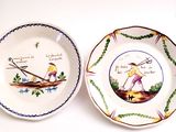 two plates with a picture of a man and a woman on them