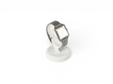 an image of a wrist watch on a stand on a white surface