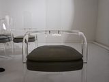 a chair that is sitting in the middle of a room