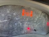 a close up of a speedometer in a car