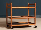 a small wooden shelf with two shelves on it