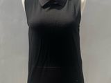 black sleeveless top on a mannequin base with a bow tie