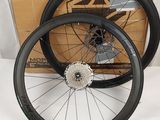 the wheels are black and have spokes on them