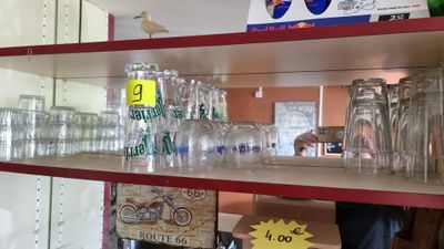 many empty glasses on the shelves in the store