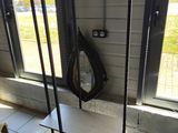 a picture of a gym equipment rack with a mirror on it