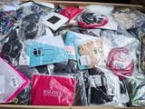 a cardboard box filled with assorted items that are in it