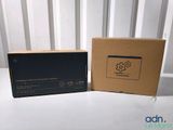 a box that is sitting next to a box with a picture on it
