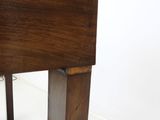 a close up of a wooden table with a marble top