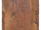 an old piece of wood with a picture of a woman on it