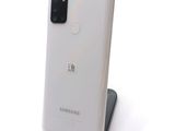 the back of a white samsung galaxy note 10 lite on a white surface
