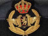 a military hat with a crown on top of it