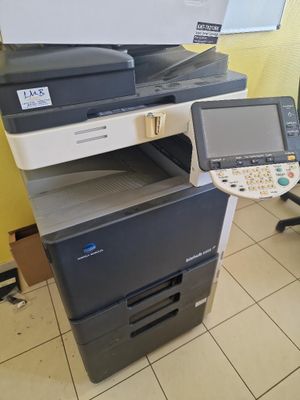 a photo of a multi - function printer in a room
