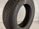 a close up of a tire on a white surface