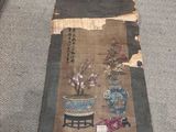 a long piece of fabric with a painting on it
